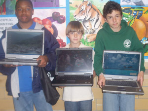 [Picture]: students win laptops in technology competitions