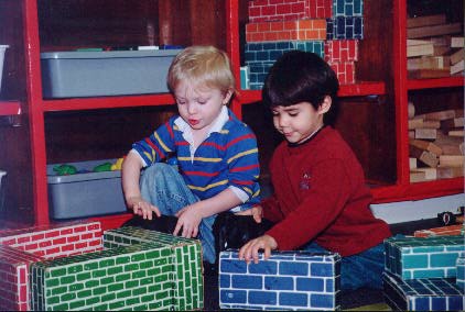[Picture of playing with blocks]
